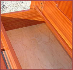 Interior drawer bottom.